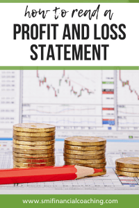 profit and loss statement with a stack of gold coins and a red pencil