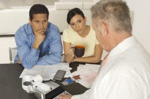 Financial coach meeting with small business owners