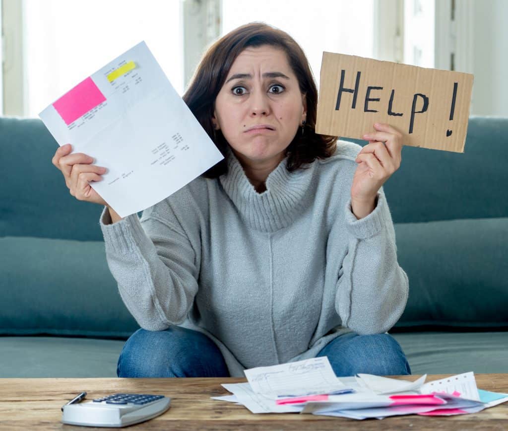 woman dealing with bills and financial anxiety