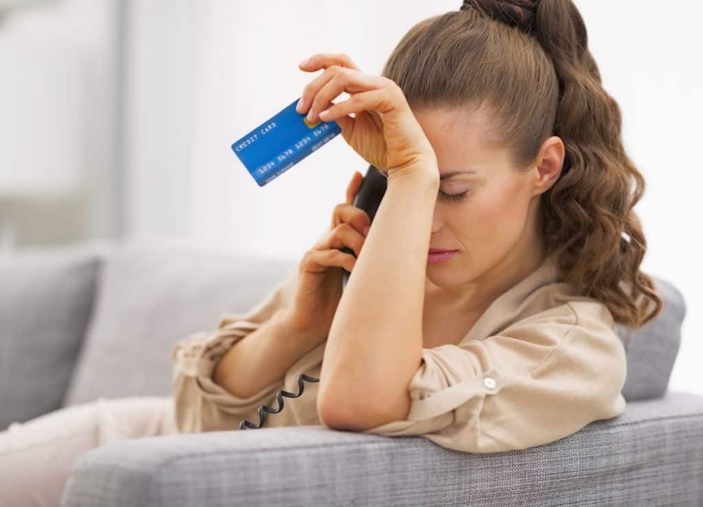 Frustrated business owner in credit card debt 